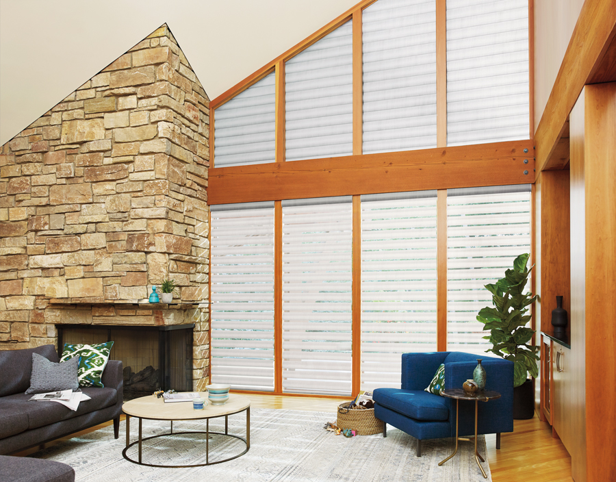 White with warm wood tones living room pirouette shades Hunter Douglas San Antonio 78249