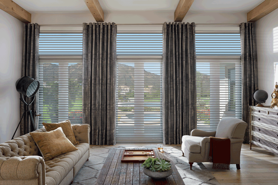 living room silhouette shades covering floor to ceiling windows Hunter Douglas San Antonio 78249