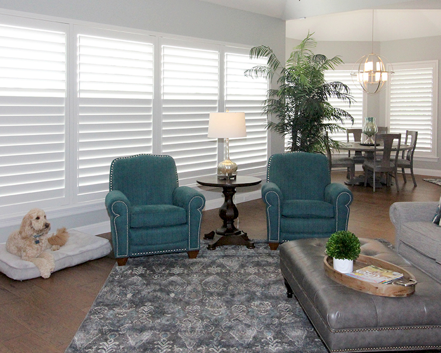 family room plantation shutters covering floor to ceiling windows Hunter Douglas San Antonio 78249