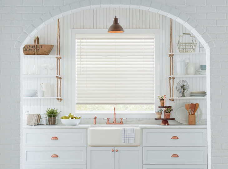 all white kitchen with open shelving and white wood blinds san antonio TX