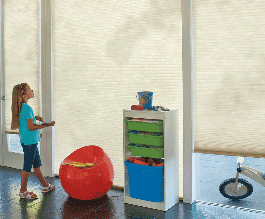 San Antonio home with motorized shades, important for child safety.