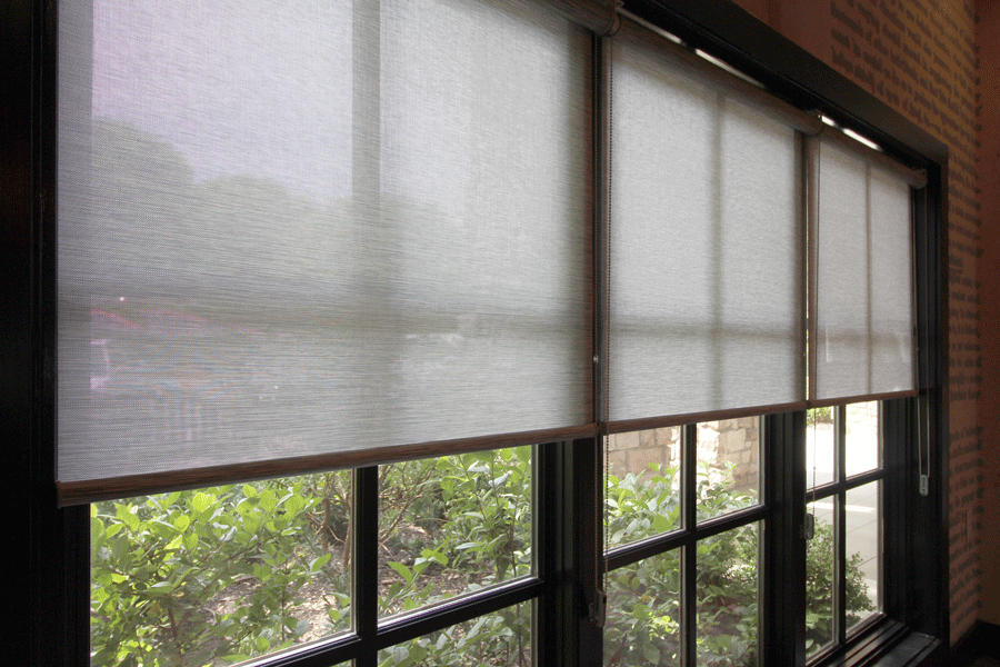 black window trim with gray roller shades San Antonio