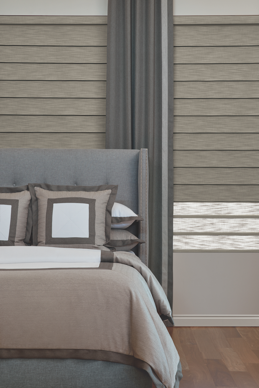 Bedroom with Duolite® Vignette Roman Shades.