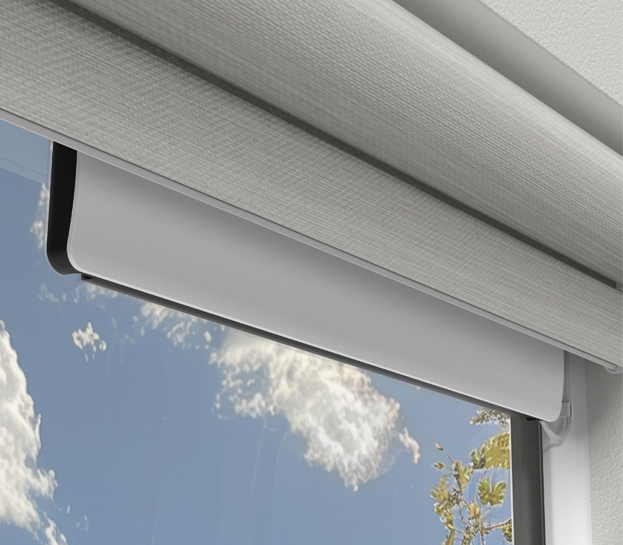 Solar charger installed in window for Hunter Douglas PowerView motorized shades