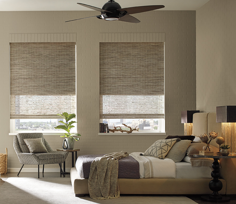 contemporary bedroom with neutral woven wood shades in San Antonio TX