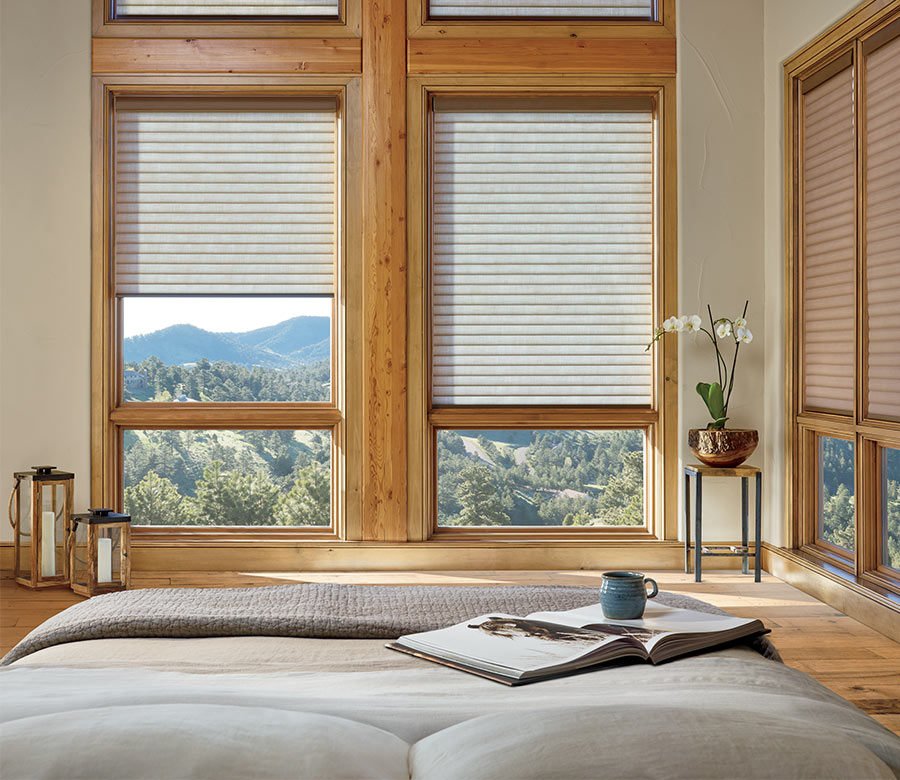 bedroom with energy saving shades in cellular roller shades in San Antonio TX