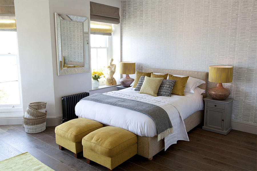 Yellow and gray master bedroom.