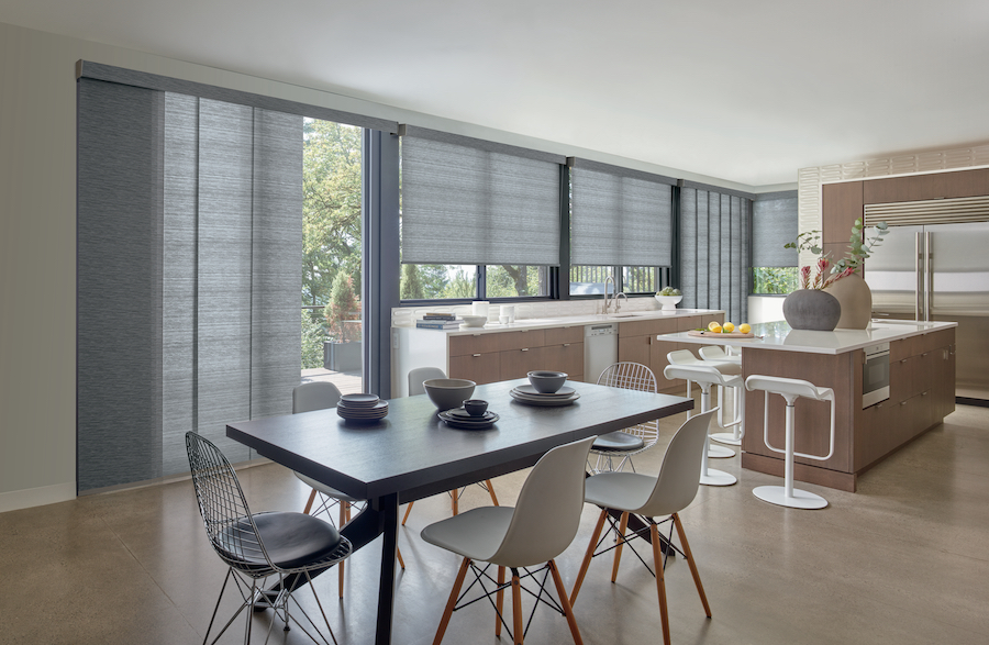 Gray Hunter Douglas blinds in kitchen designer roller shades