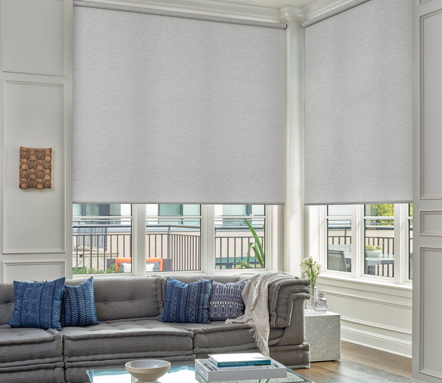 large windows with roller shades in living room of San Antonio Home