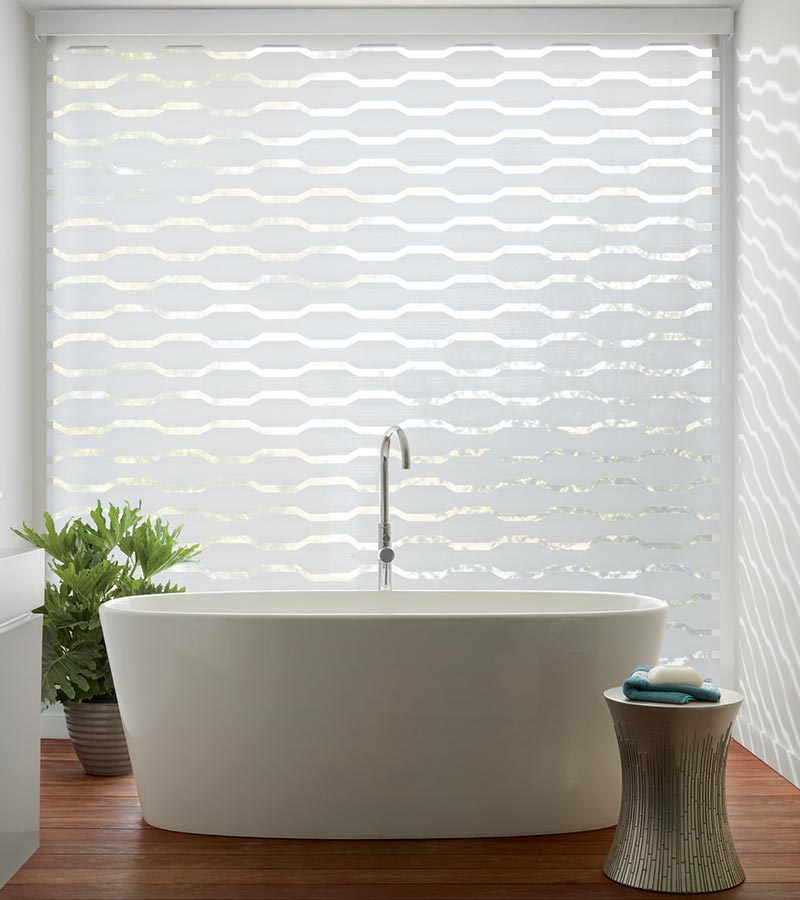 patterned window shades with automation in modern white bathroom Bexar County, TX