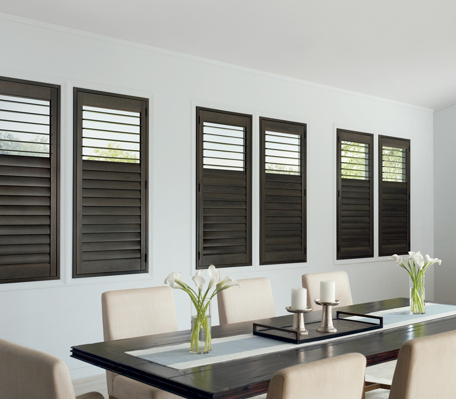 Dining room with interior shutters on windows