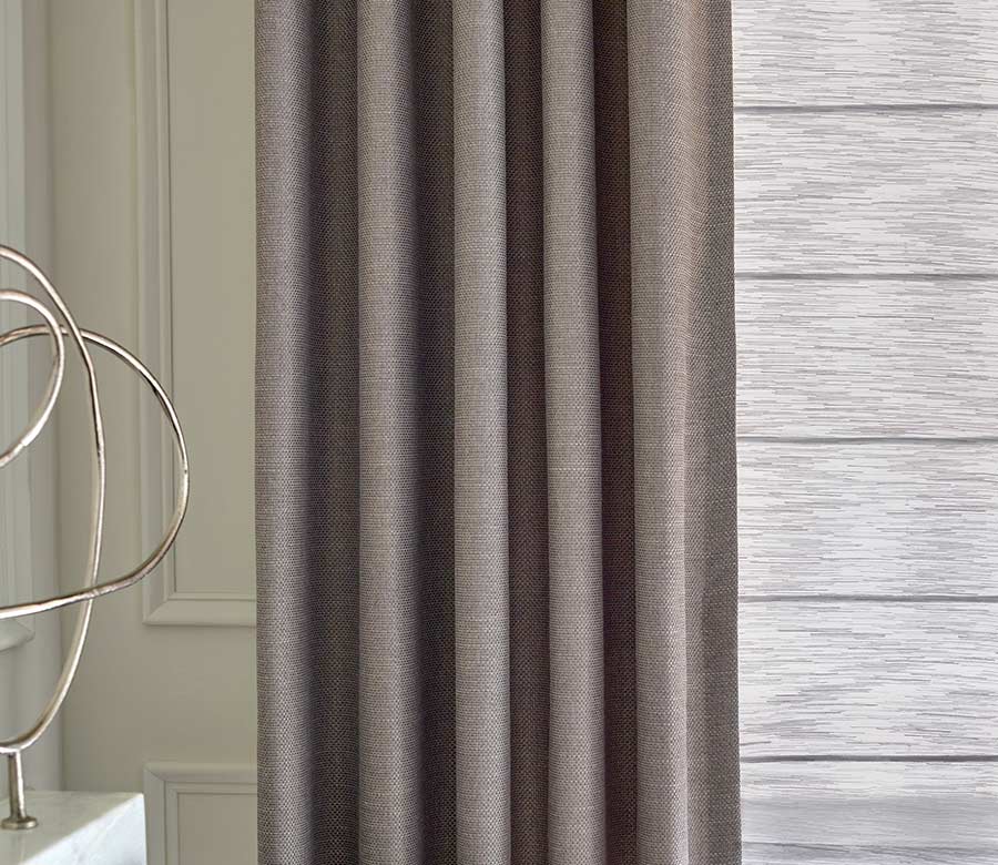 detail of custom fabric drapes in eggplant color
