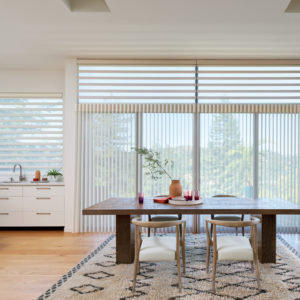 whole-house-window-treatments-mixed-collections-window-fashions-of-texas sheer shades on windows with vertical sheers on doors for a coordinated look