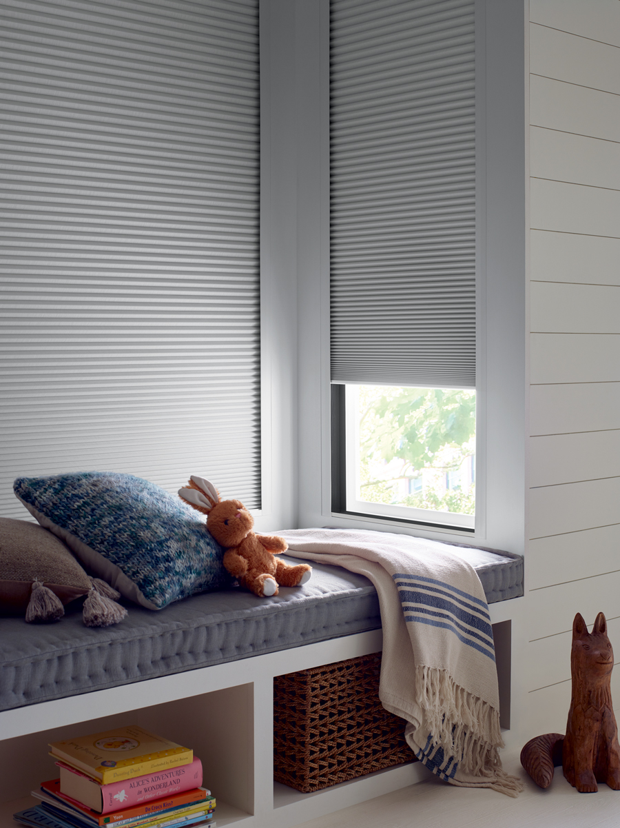 honeycomb shades with side channels to seal out light and heat