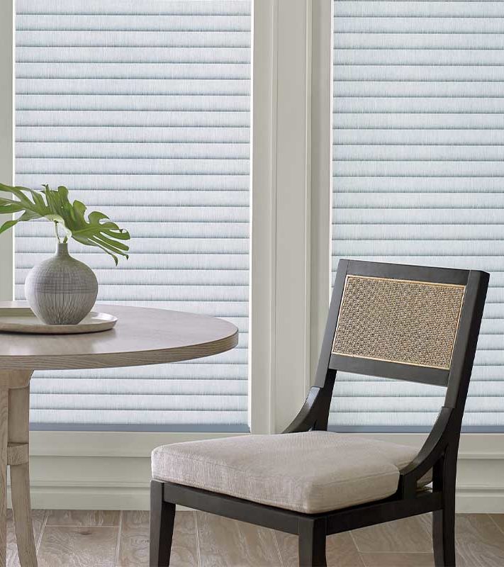 dining room with floor to ceiling UV protection shades in San Antonio, TX