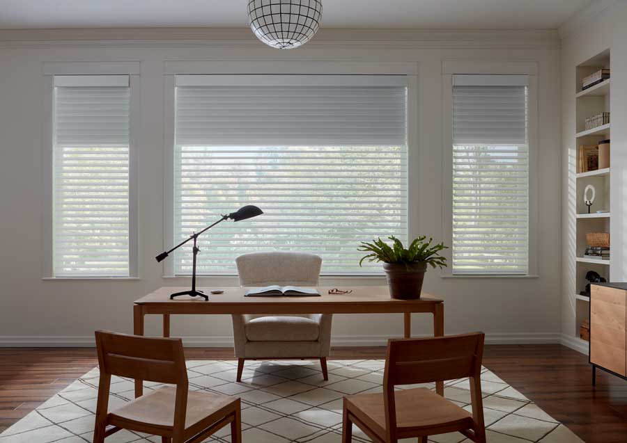 dual sheer shades on three windows in home office in San Antonio