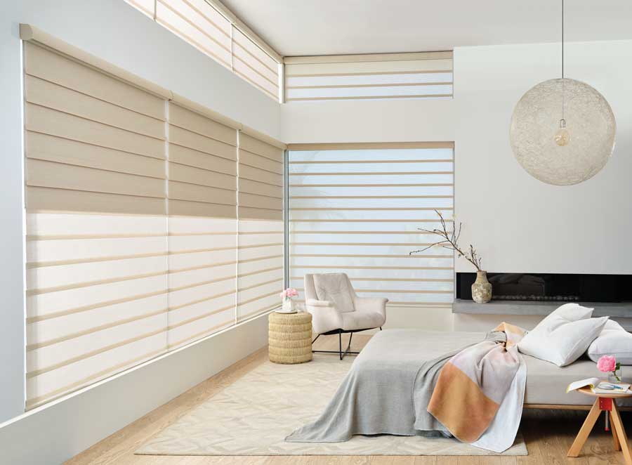 Airy bedroom with roman shades