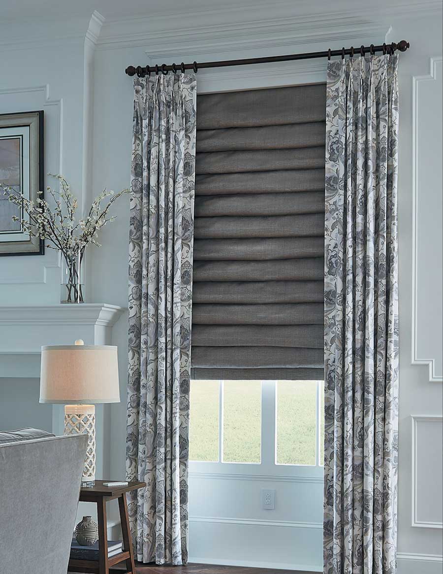 layered fabrics with roman shades and draperies in San Antonio