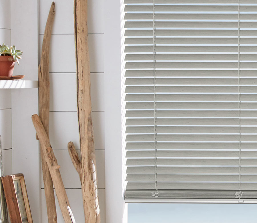 gray composite blinds in primary bathroom