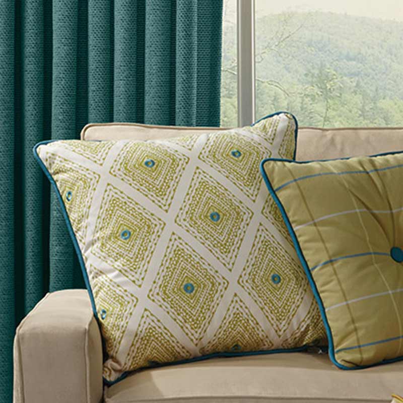 matching custom pillow covers with teal window shades