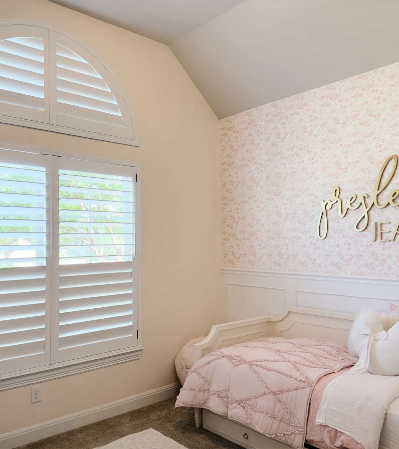 white wood shutters in nursery for light control and privacy