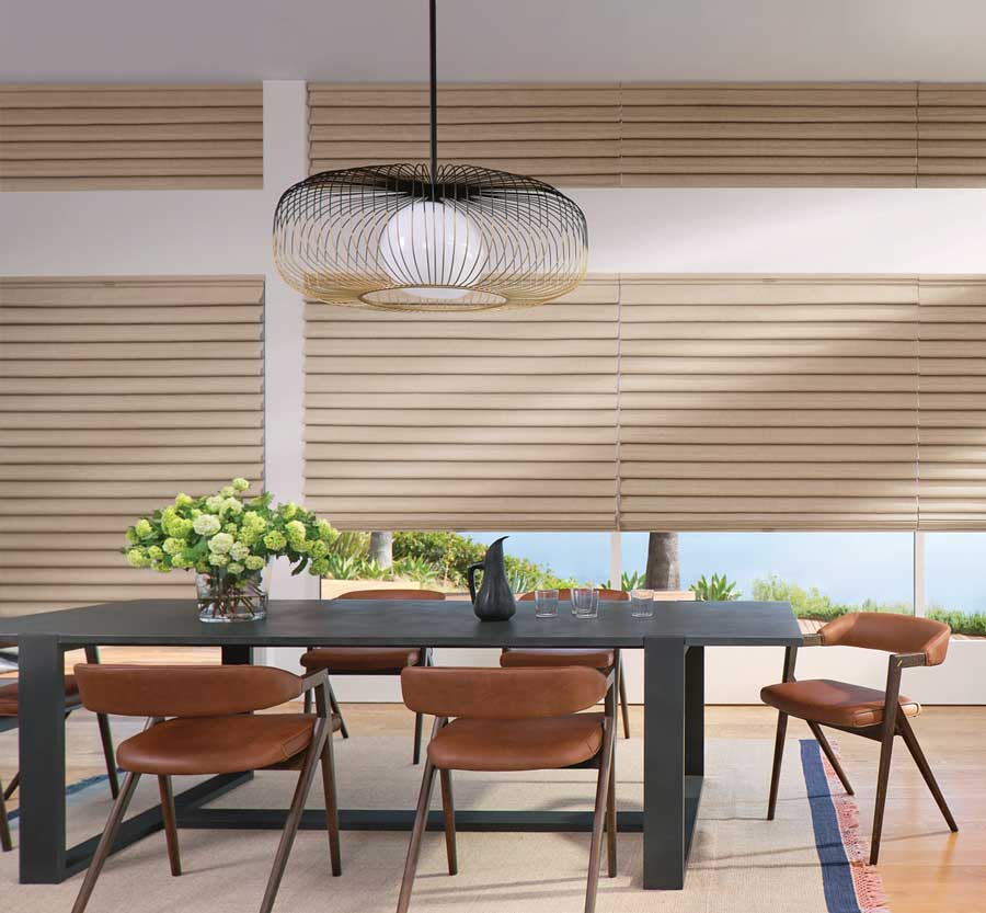 dining room with roman shades
