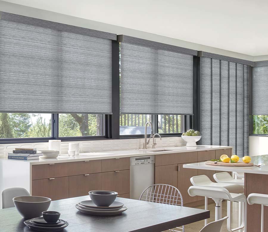kitchen with gray blue designer roller shades