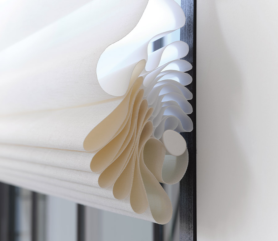 close up of stacking roman shades in texas