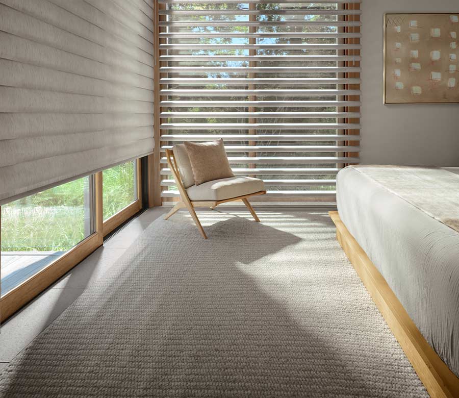 pirouette-primary-bedroom-window-treatments-hunter-douglas-window-fashions-of-texas master bedroom with beige pirouette shades with closed and open vanes