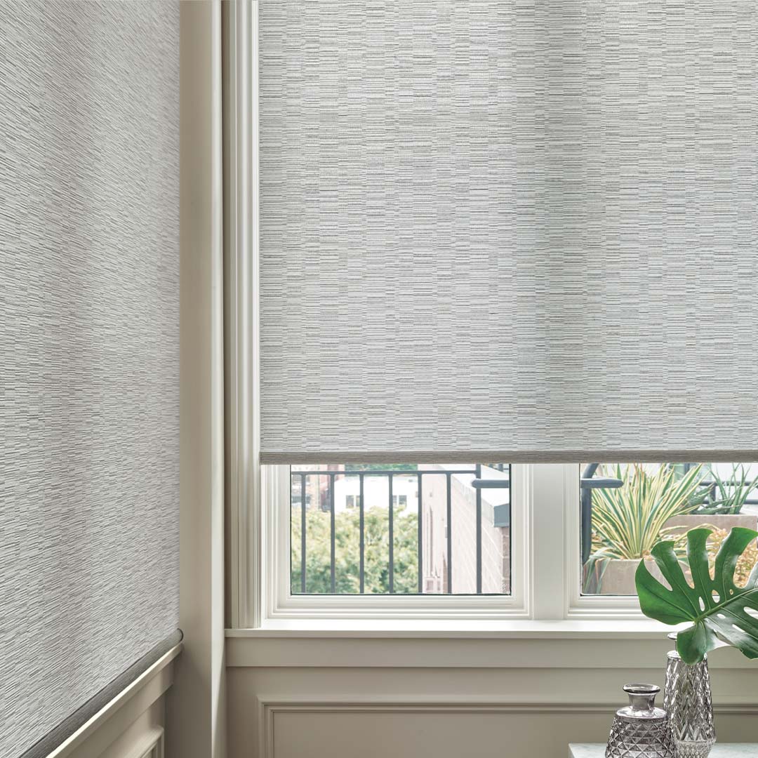 designer-roller-shades-detail-living-room-grey-featured-product-hunter-douglas-window-fashions-of-texas